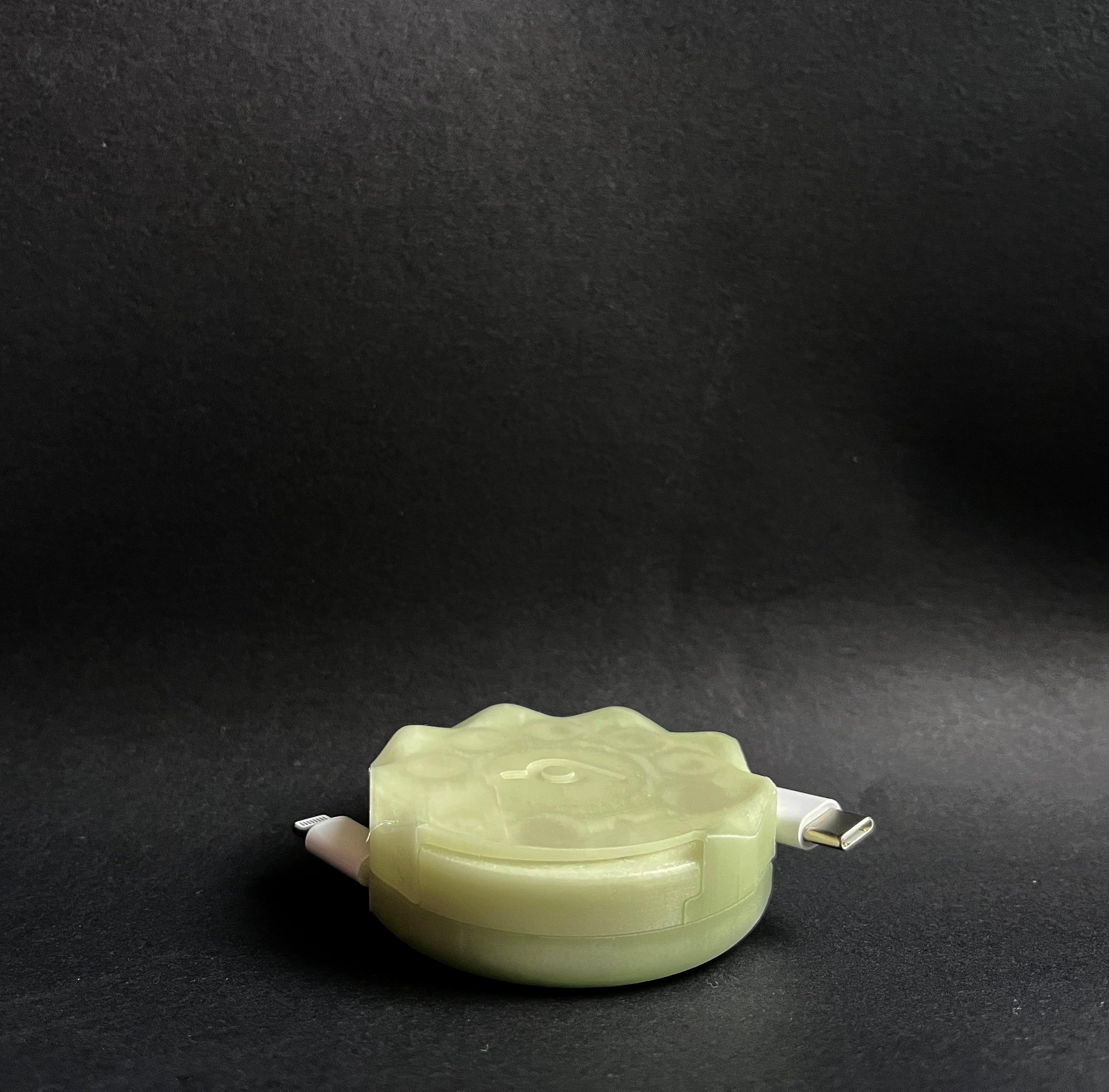 Glow in the Dark ghost pebble. Automatic cable organiser. 